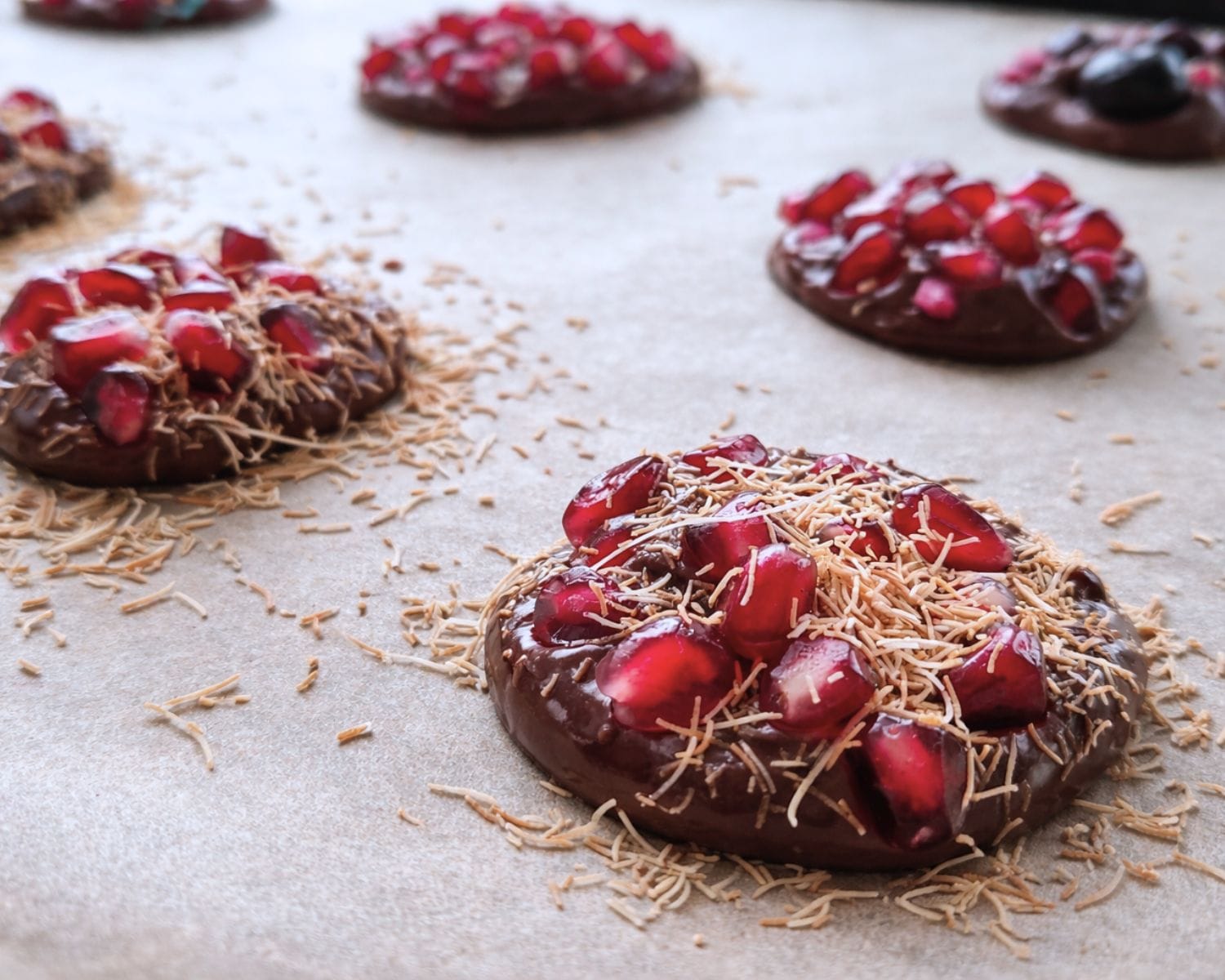 No-bake pomegranate chocolate bites topped with kataifi
